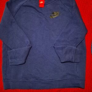 Nike sweat shirt . Medium adult. Drk blue. Black Nike emblem left shoulder area